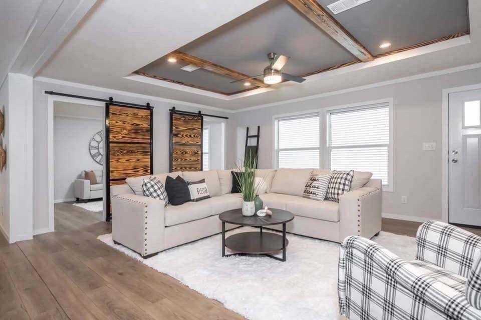 Furnished living room in the Chelsea model